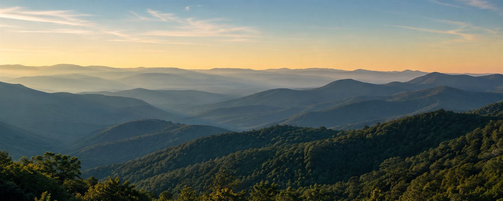 Blue Ridge mountains rising over Western North Carolina, where the engine runs in production